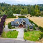 Aerial view showcasing the expansive property and surrounding greenery at 5841 Willow Springs Way, Ferndale, listed by Andi Dyer