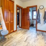 Well-appointed bathroom with extensive counter space and integrated storage solutions, listed by Andi Dyer